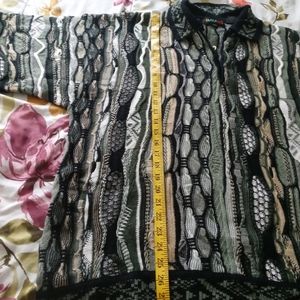 Green baucci sweater.